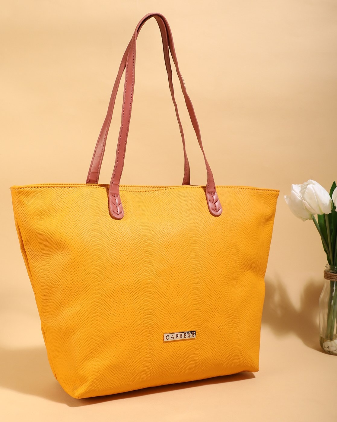 Buy Peach Handbags for Women by CAPRESE Online | Ajio.com
