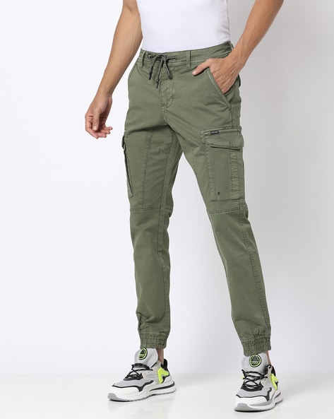 Buy Ecko Unltd Men Olive Green Solid Cargo Trousers on Myntra |  PaisaWapas.com