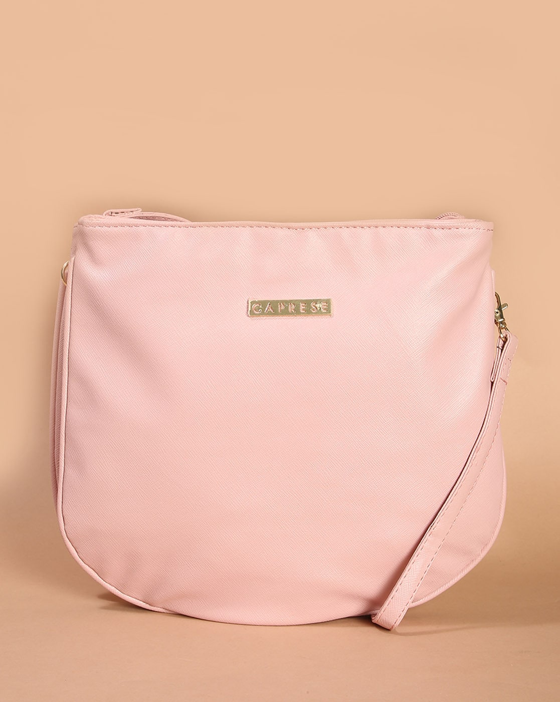 Caprese pink store sling bags