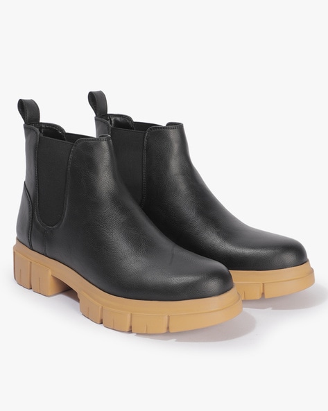 Black cleated sale boots