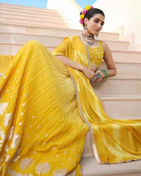 Yellow floral lehenga for #Haldi ceremony. | Floral lehenga, Lehenga, Yellow  lehenga for haldi