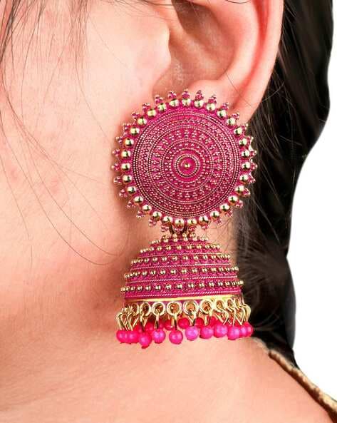 Pink and store gold jhumkas