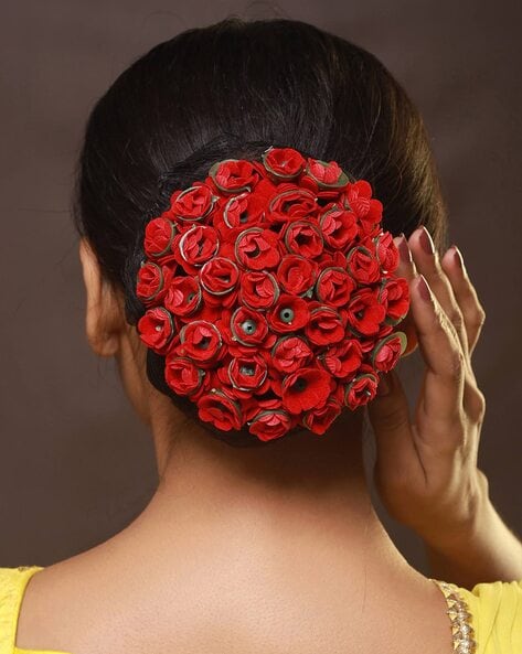 Redhead beautiful woman rose petals on hair Redhead beautiful woman with  colorful rose petals on hair  CanStock