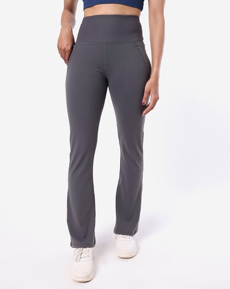 https://assets.ajio.com/medias/sys_master/root/20230322/iKlh/641aa2a5711cf97ba7d987f3/blissclub-grey-fitted-tall-the-ultimate-flare-pants-with-4-pockets.jpg