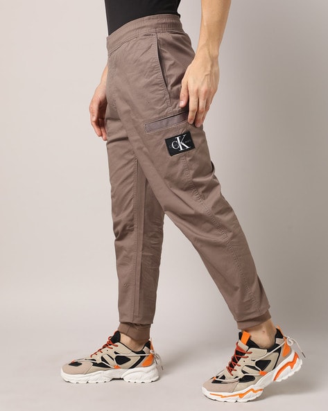 Buy Brown Trousers & Pants for Men by Calvin Klein Jeans Online