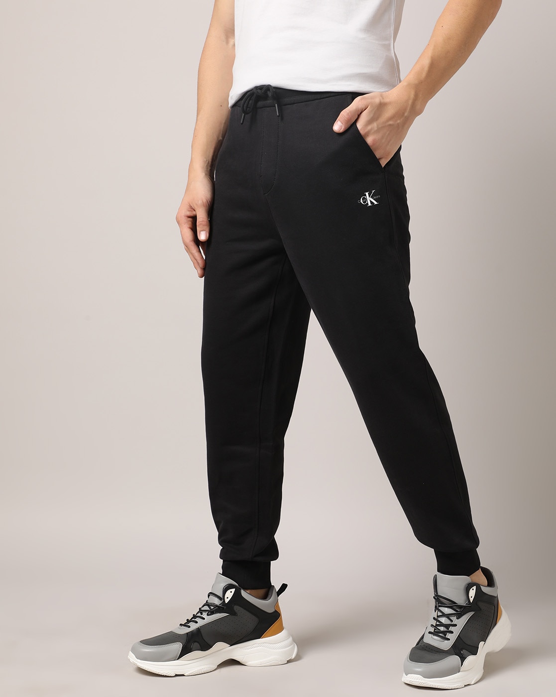 Buy Calvin Klein Jeans Men Solid Pure Cotton Joggers  Track Pants for Men  23832808  Myntra
