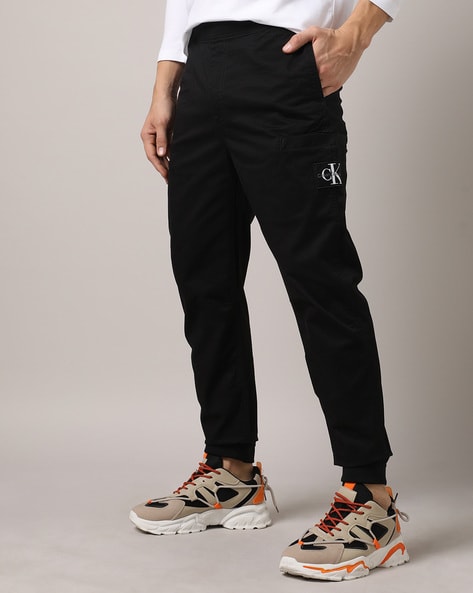 BUKSET Men's Polyester Lycra Regular Fit Track Pants | Regular Fit Solid Trackpants  Jogger | Polyester Lycra Lower for Men's and Boys (Small, Black) :  Amazon.in: Clothing & Accessories