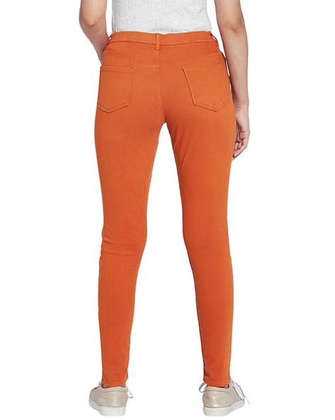 Orange jeggings on sale