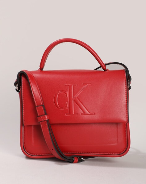 CALVIN KLEIN JEANS - Women's red shoulder bag with embossed logo