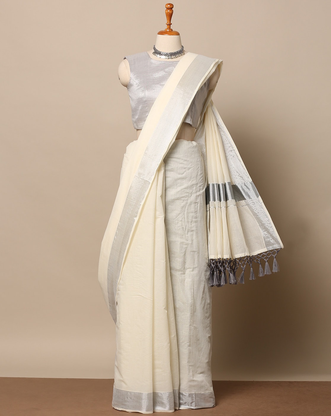 Off White Kerala Kasavu Plain Saree With Plain Body And Gold Silver Zari  Border And Pallu at Best Price in Erode | Manvish Drapes