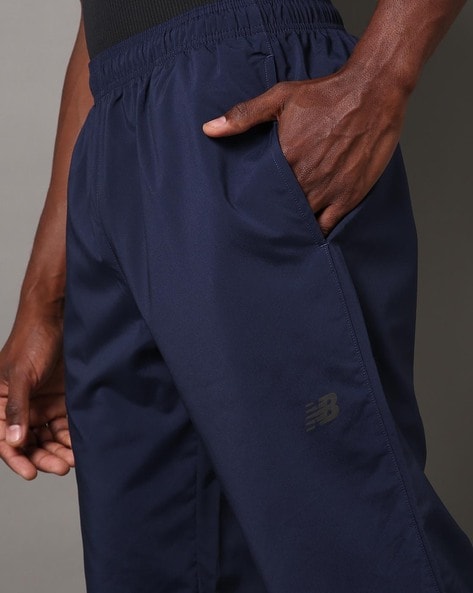 Buy Blue Track Pants for Men by NEW BALANCE Online
