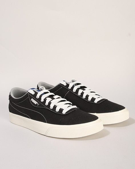 Puma black canvas discount shoes