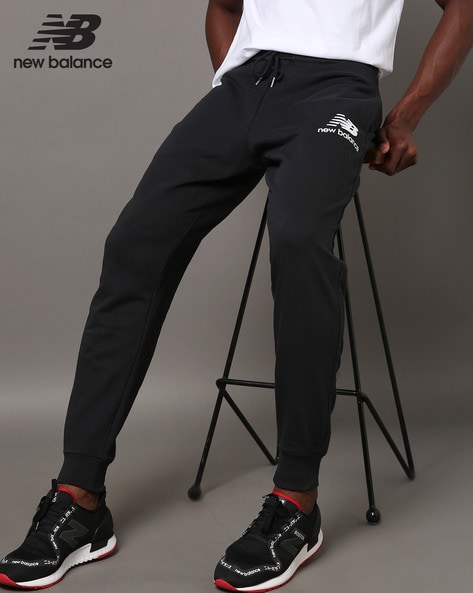 New Balance Solid Men Black Track Pants  Buy New Balance Solid Men Black Track  Pants Online at Best Prices in India  Flipkartcom