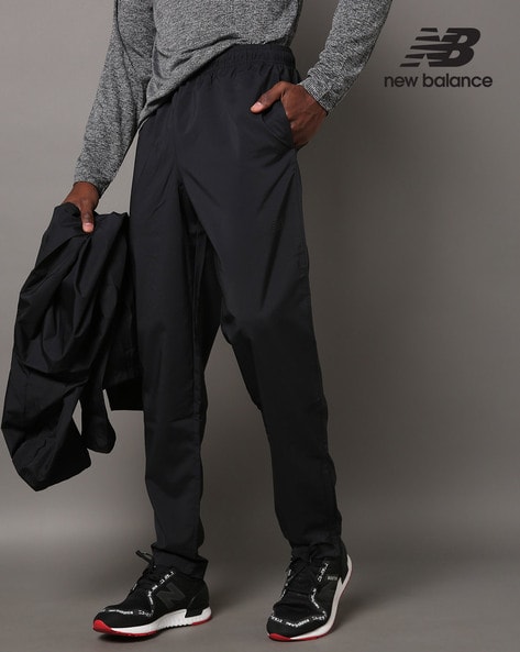 Buy New Balance Men Charcoal Grey Solid Track Pants - Track Pants for Men  15870010 | Myntra