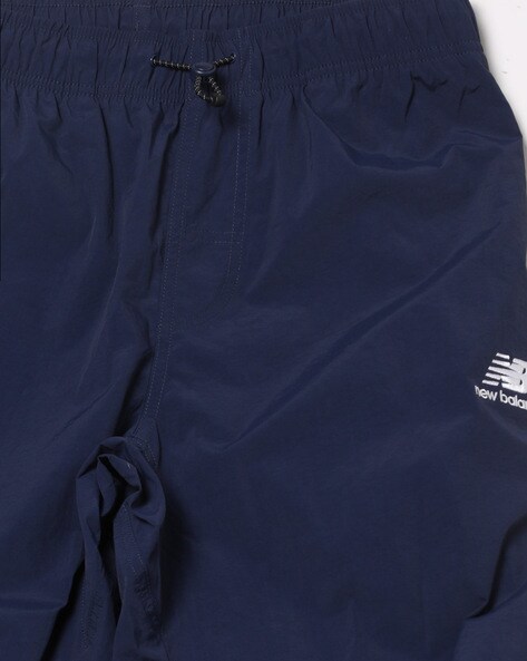 Buy Blue Track Pants for Men by NEW BALANCE Online