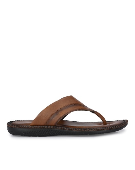 Tan flip flops with black straps new arrivals