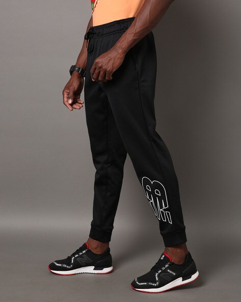 Buy Black Track Pants for Men by NEW BALANCE Online Ajio