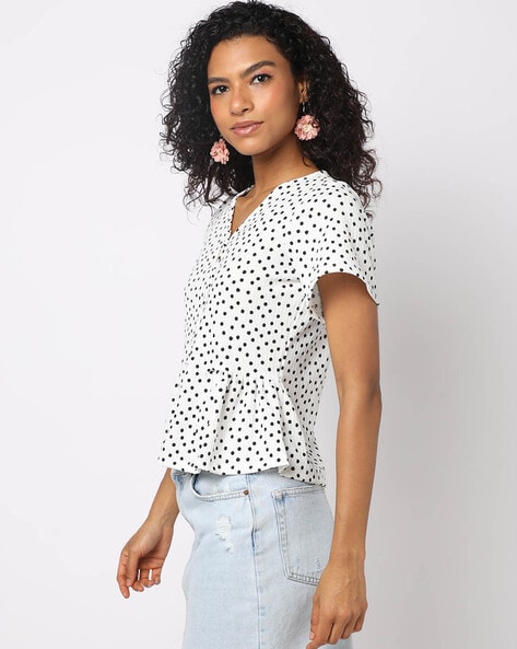 Spotty store peplum top