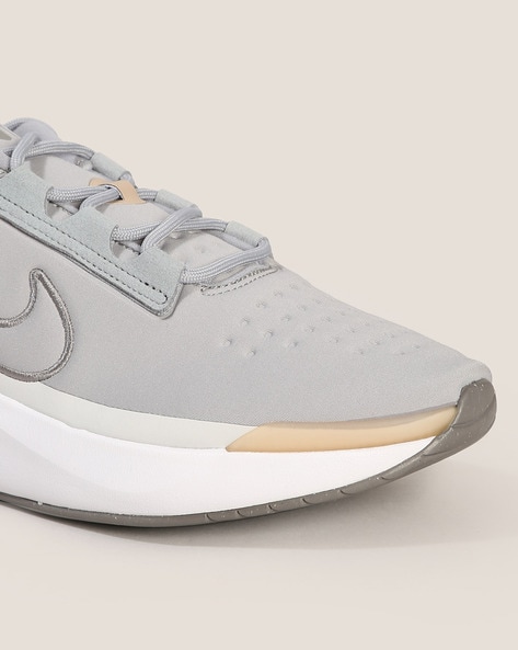 Nike white best sale gray shoes