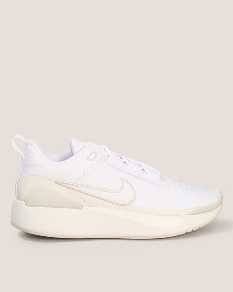 White nike store shoes low tops