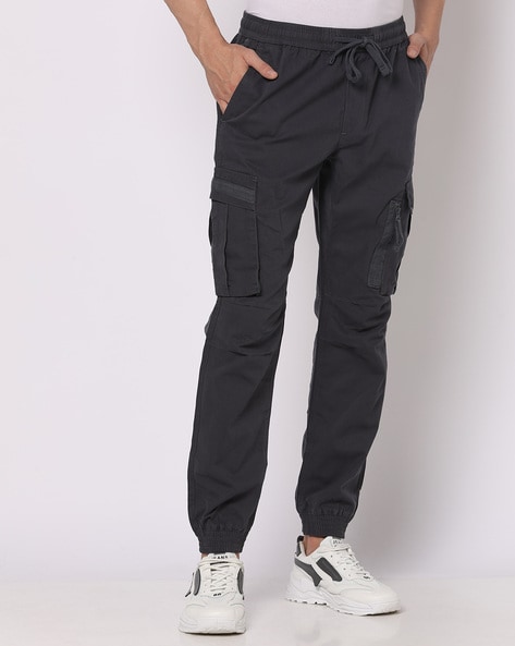 Buy Charcoal Grey Trousers & Pants for Men by DNMX Online