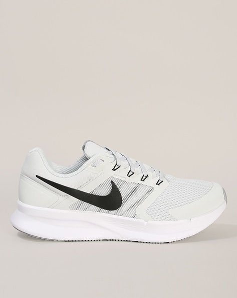 Buy Grey Sports Shoes for Men by NIKE Online
