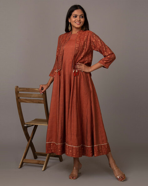 Rust colour printed Ajrakh dress with black detailing & pockets – Sujatra