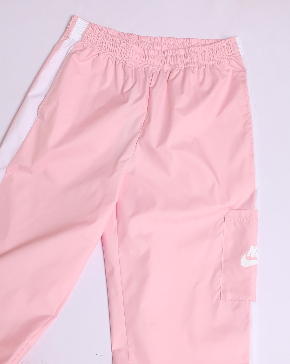Nike World Tour Pack graphic woven cuffed cargo joggers in pink