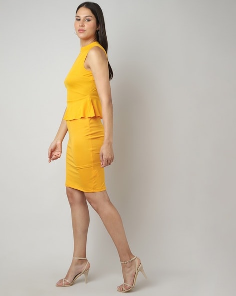 Cute yellow peplum dress | Latest african fashion dresses, African fashion  dresses, African print fashion dresses