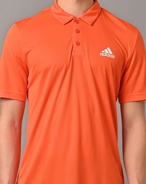 Orange adidas golf shirt discount