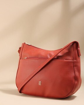 Baggit red solid sling on sale bag