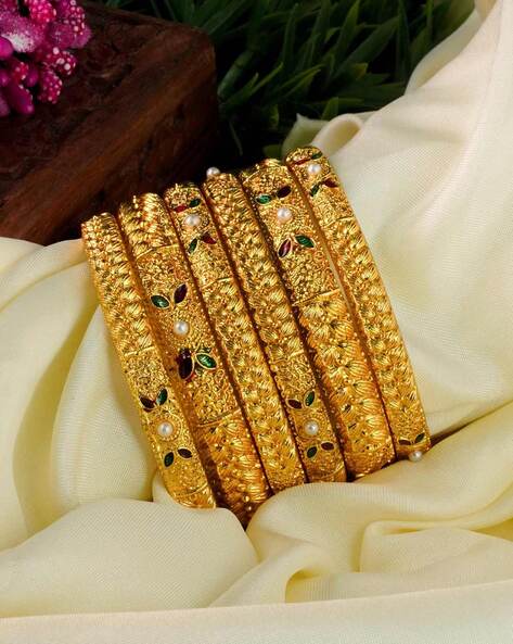 Six gold bangles on sale set