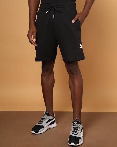 Puma Logo Print Flat-Front Knit Shorts