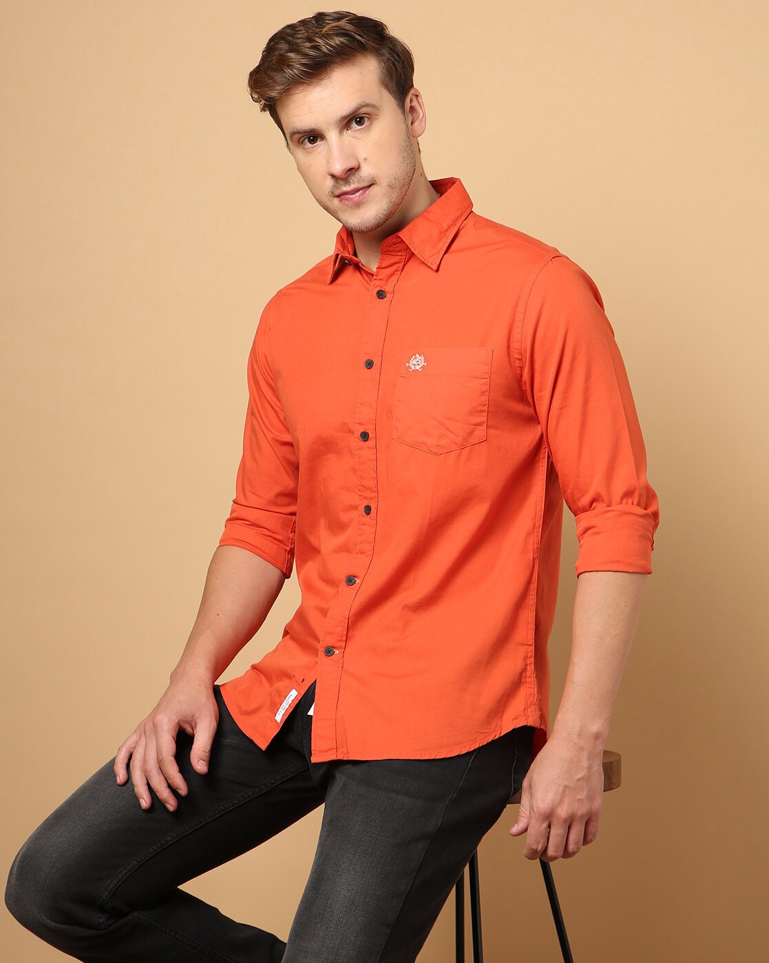 orange color shirt