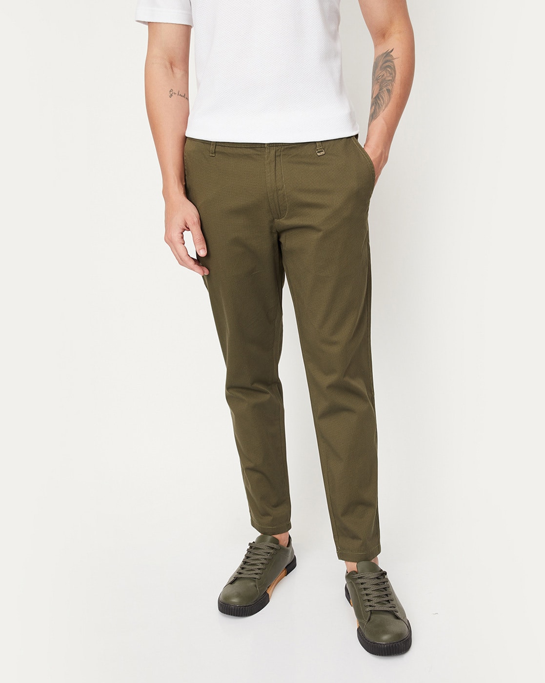 Buy Men Solid Carrot Fit Casual Trousers from Max at just INR 12990