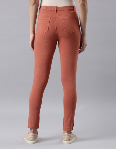 Buy Go Colors Women Rust Solid Jeggings online