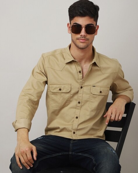 Khaki shirt and store jeans