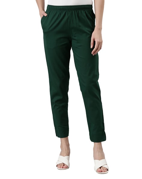 https://assets.ajio.com/medias/sys_master/root/20230511/Ea5Y/645d01a4d55b7d0c63a7f1ca/go-colors-bottle-green-pants-cotton-pants-with-elasticated-waist.jpg