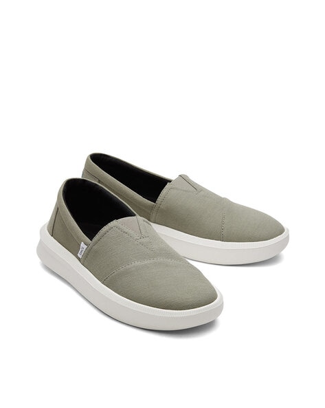 Toms on sale white trainers