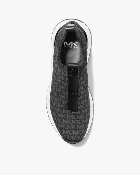 Michael Kors Women's Teddi Slip On Trainers Shoes Sneakers White Black Size  5M | SidelineSwap
