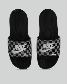 Nike benassi slides best sale mens black and white