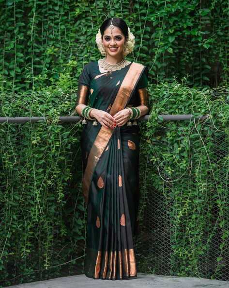 Stunning Green Soft Silk Saree With Innovative Blouse Piece