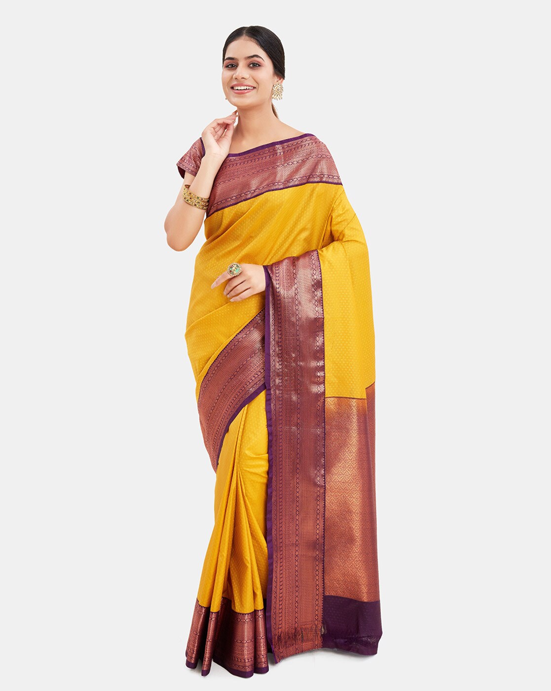 Kalyan Silks - Item : Party wear Silk Saree Color : Maroon Blouse : Maroon  [ Plain with border] Fabric : Kanchipuram pure silk saree Work :This  kanchipuram silk saree is embellished