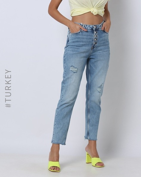 Mid rise destructed slim crop jeans