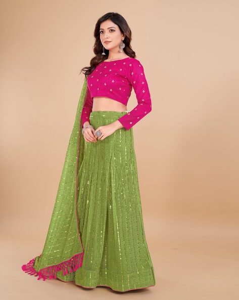 LIME GREEN LEHENGA SET WITH BUTIS AND AN EMBROIDERED GOTA WORK BLOUSE  PAIRED WITH A MATCHING DUPATTA AND SILVER BEADED TASSELS. - Seasons India