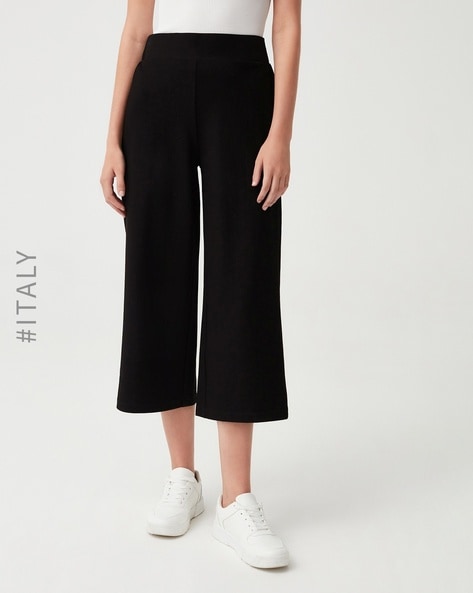 Roman Curve Stretch Plisse Culotte Trousers in Black | Lyst UK