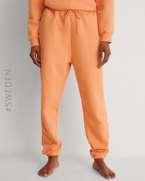 Bright orange online joggers