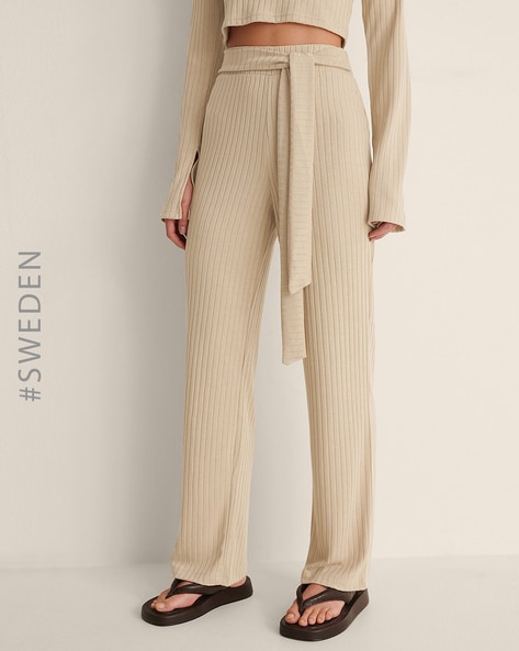 Buy RIB-KNIT APRICOT BELL-BOTTTOM TROUSERS for Women Online in India