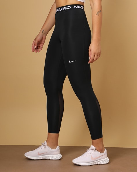 Nike Pro Women's High-Waisted 7/8 Training Leggings with Pockets. Nike.com