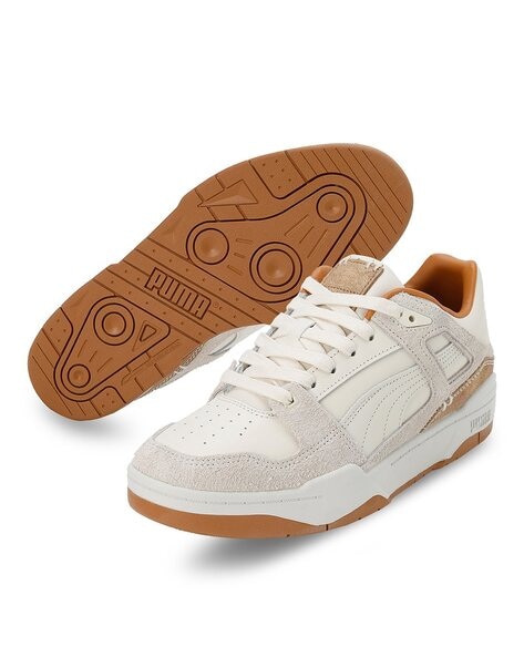 Premium Photo  A pair of puma shoes is on fire and the word  on